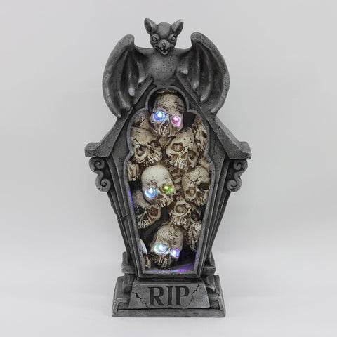 25.5''Light-Up RIP Tombstone with Stacked Skulls Halloween Decoration – Spooky Indoor/Outdoor Décor