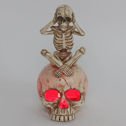 3.0*3.5*6.75'' Resin Covering Ears Ghost Sitting On Skull Décor W/Lite