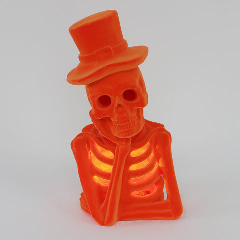 5.5*4.5*10.25''Orange Flocking Thinking Skeleton W/Hat Décor