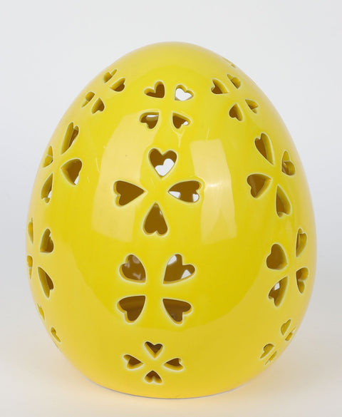 Oeuf en céramique avec décoration lumineuse